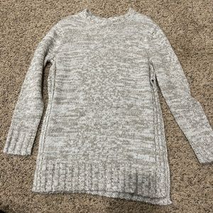 Deep side cut sweater
